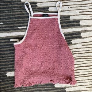 Pink smocked halter crop top with white straps